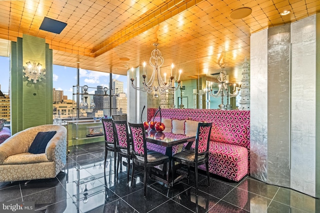 dining area with a notable chandelier