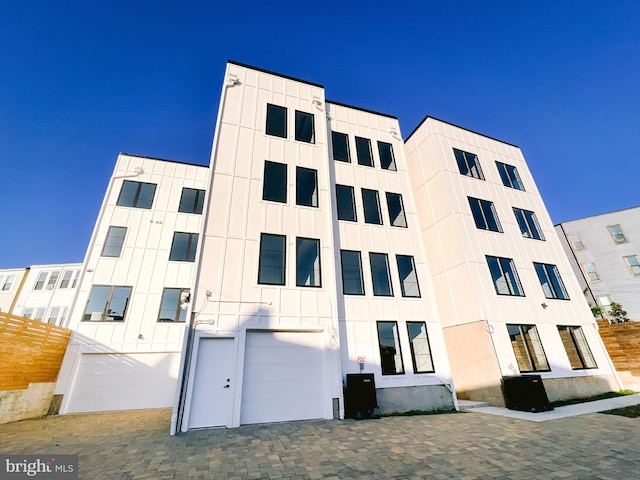 view of building exterior featuring a garage