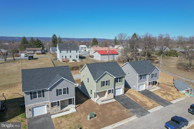 drone / aerial view with a residential view