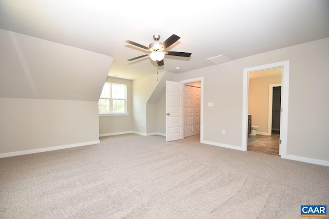 bonus room with light colored carpet, ceiling fan, and lofted ceiling