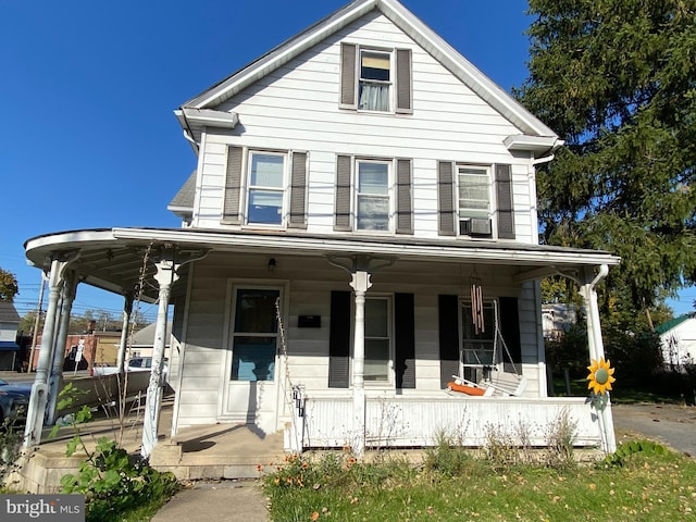 view of front of home featuring covered porch