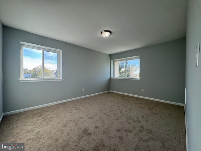 10204 Prince Pl Unit 3-308, Upper Marlboro, MD 20774 - carpeted empty room featuring baseboards
