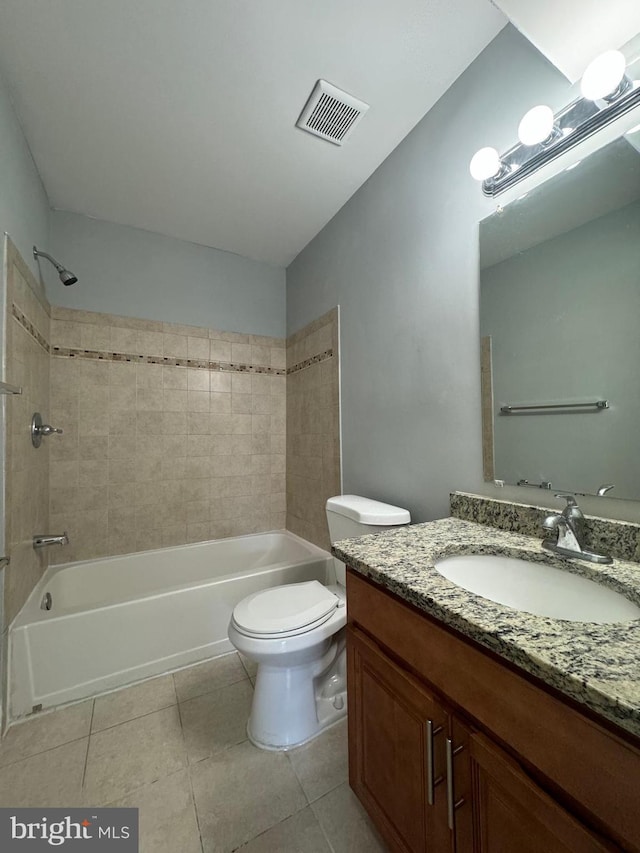 10204 Prince Pl Unit 3-308, Upper Marlboro, MD 20774 - bathroom featuring toilet, vanity, visible vents, tile patterned flooring, and bathtub / shower combination