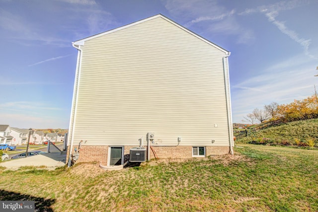 view of home's exterior featuring central AC