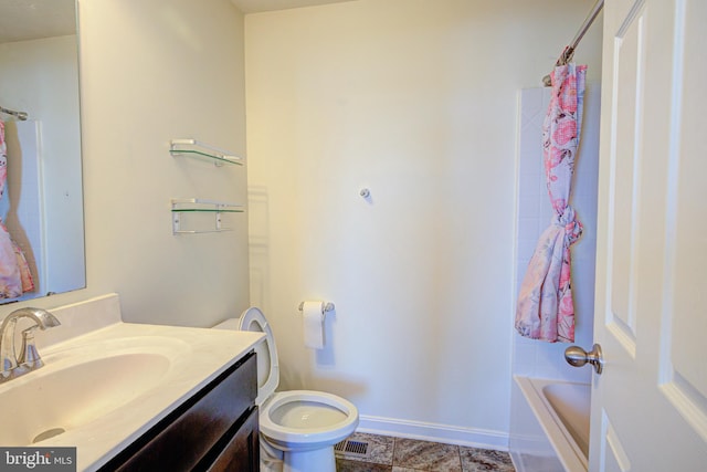 full bathroom featuring vanity, shower / tub combo with curtain, and toilet