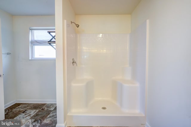 bathroom with walk in shower