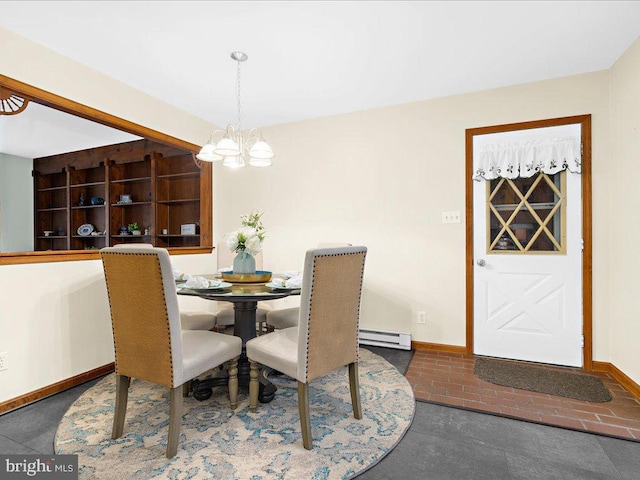 dining area with a chandelier and baseboard heating