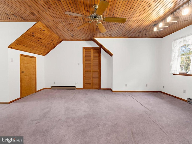 bonus room featuring lofted ceiling, wood ceiling, carpet, and ceiling fan