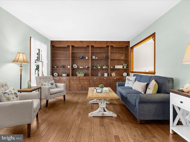 living room with dark wood-type flooring