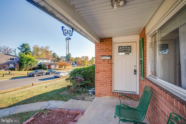 doorway to property featuring a porch