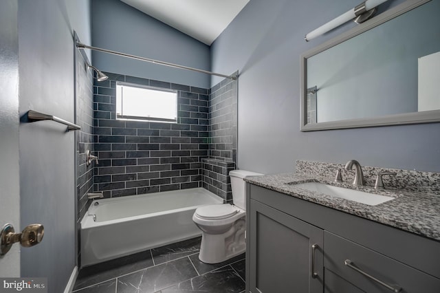 full bathroom featuring lofted ceiling, tiled shower / bath combo, toilet, and vanity