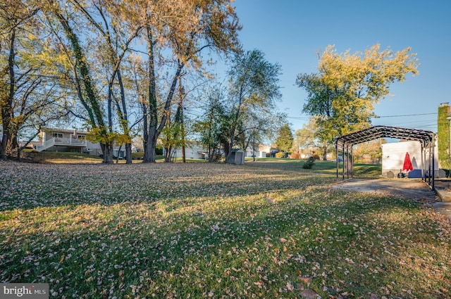 view of yard with a carport