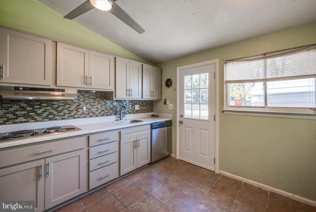 kitchen featuring vaulted ceiling, decorative backsplash, sink, exhaust hood, and stainless steel dishwasher