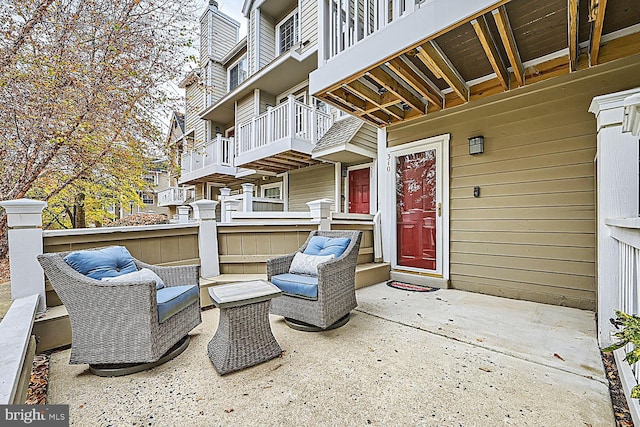 view of patio / terrace featuring an outdoor hangout area and a balcony