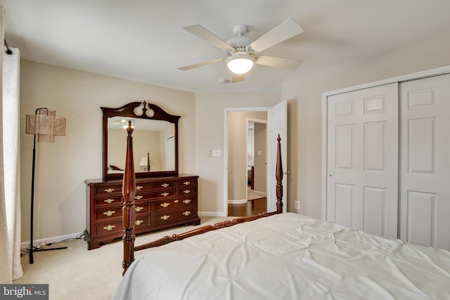 bedroom with carpet floors, a closet, and ceiling fan