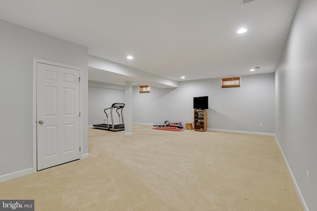 exercise area featuring carpet