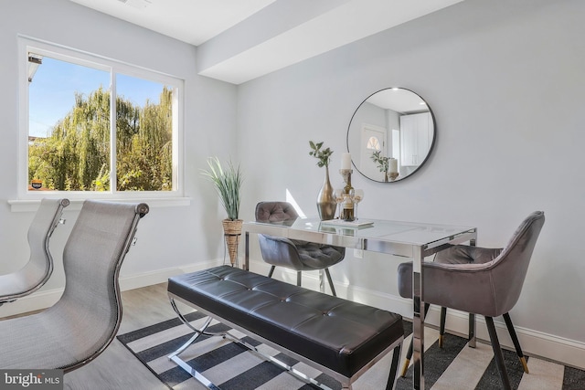 dining area with light wood-type flooring