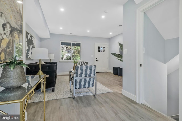 living room with light hardwood / wood-style floors