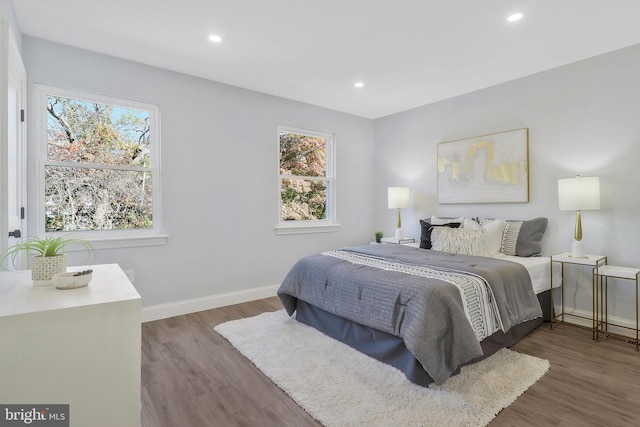 bedroom featuring dark hardwood / wood-style floors