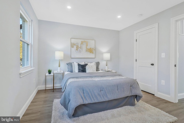 bedroom with light wood-type flooring