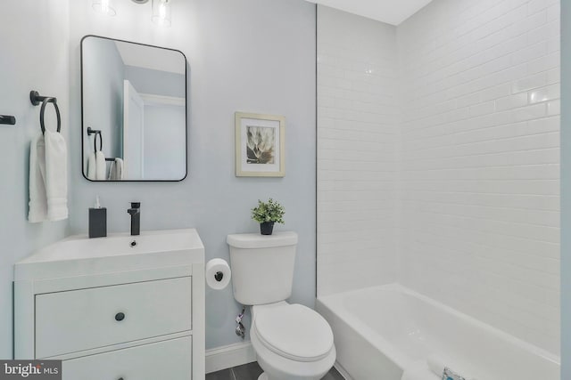 full bathroom with vanity, toilet, and tiled shower / bath