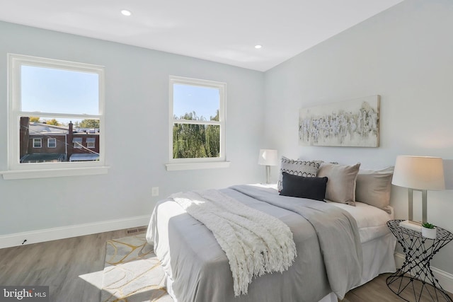 bedroom with light wood-type flooring