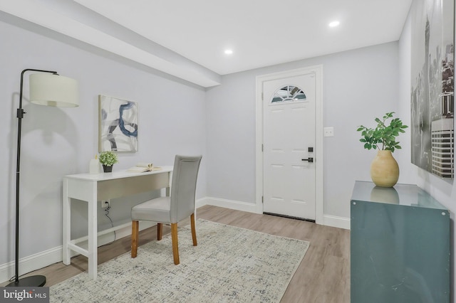 office space with light wood-type flooring