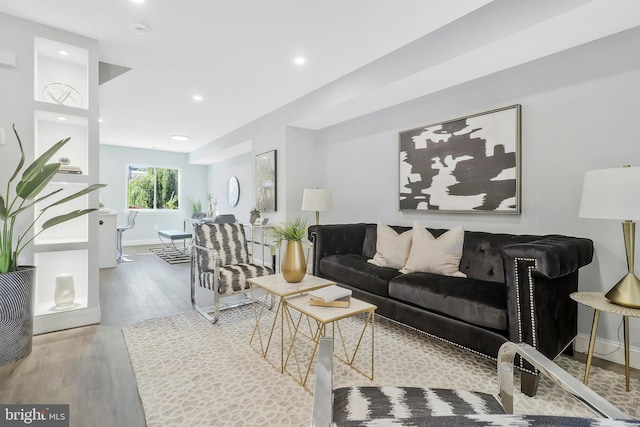 living room with light hardwood / wood-style flooring