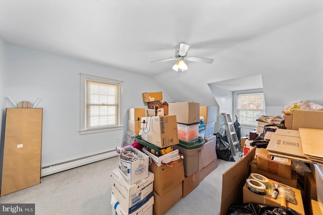 storage with ceiling fan and a baseboard heating unit