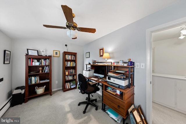 office space with ceiling fan, light carpet, baseboard heating, and vaulted ceiling