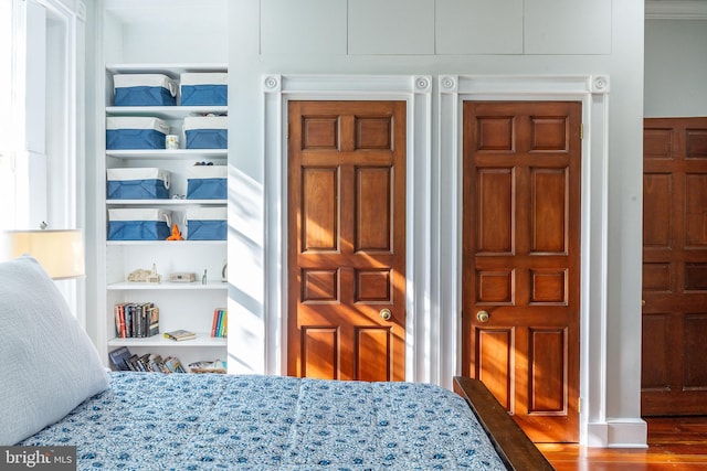 bedroom featuring hardwood / wood-style floors