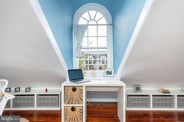 room details with wood-type flooring, built in desk, and ornamental molding