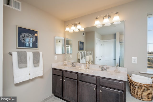 bathroom featuring vanity and walk in shower