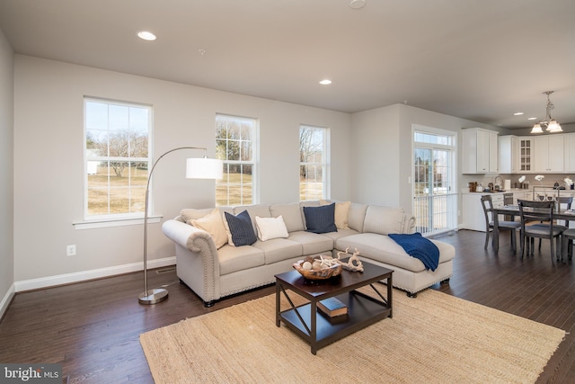 living room with dark hardwood / wood-style floors