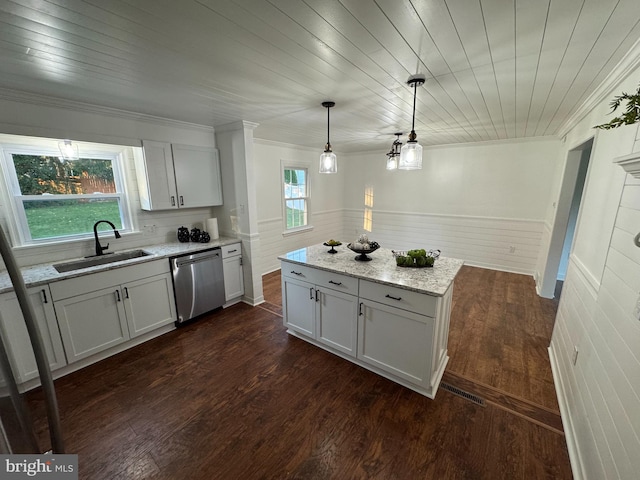 kitchen with a sink, visible vents, dishwasher, light stone counters, and ornamental molding