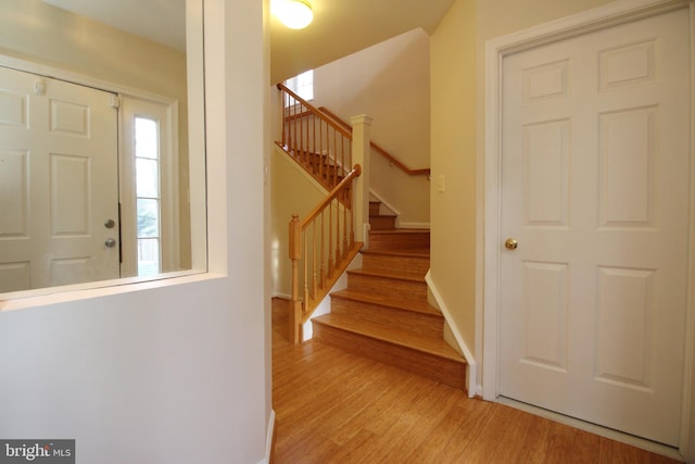 foyer with light hardwood / wood-style floors