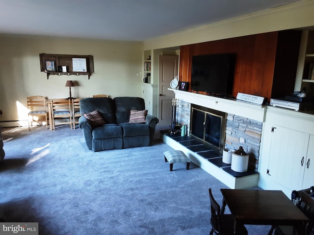 living room featuring carpet flooring and a fireplace