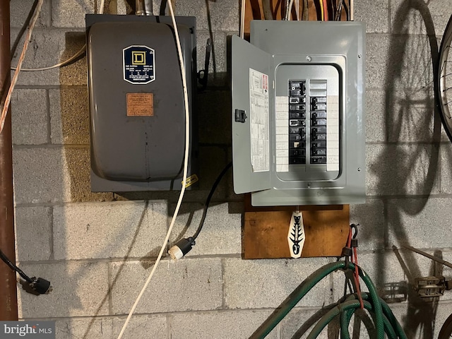 utility room featuring electric panel