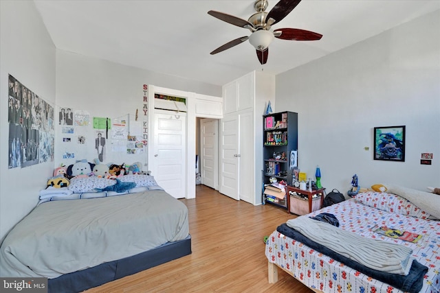 bedroom featuring ceiling fan and hardwood / wood-style flooring