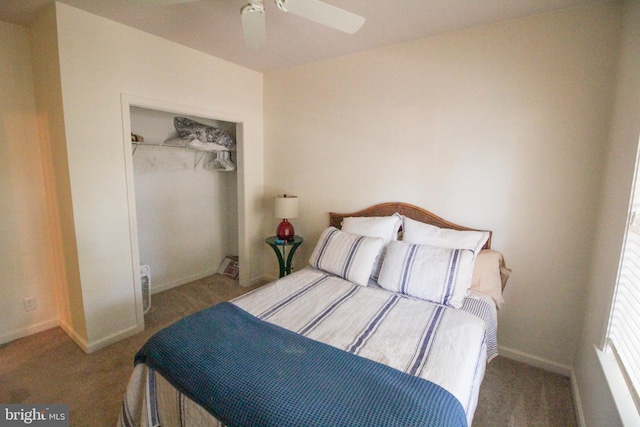 carpeted bedroom with a closet and ceiling fan