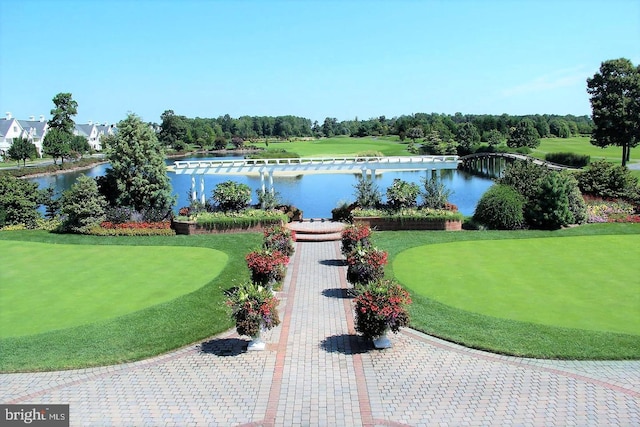 view of home's community with a water view