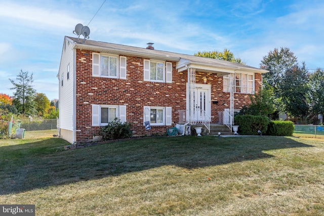 view of front of property with a front lawn