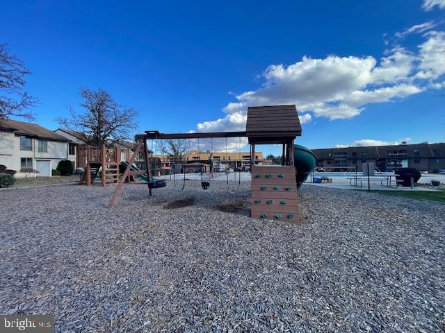 exterior space featuring a playground