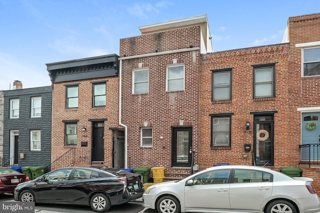 multi unit property featuring brick siding