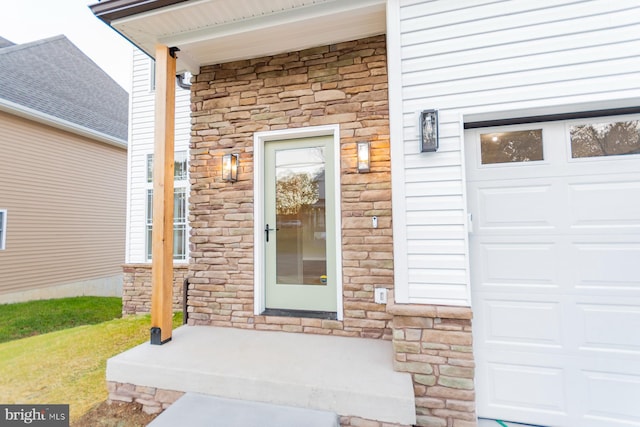 property entrance with a garage