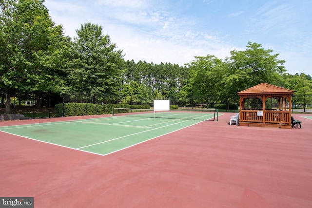 view of tennis court featuring a gazebo