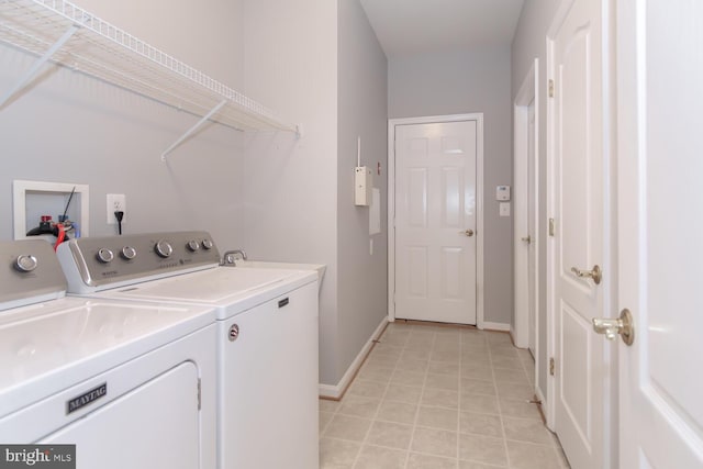 laundry area featuring washing machine and dryer