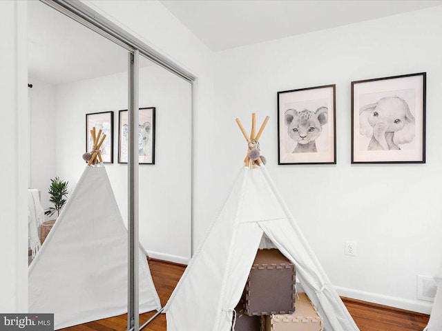 bedroom featuring hardwood / wood-style flooring