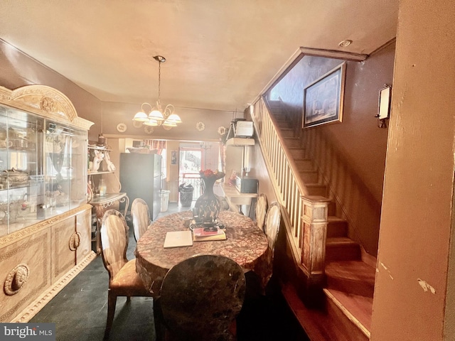 dining room with a chandelier