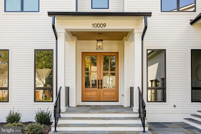 property entrance with covered porch